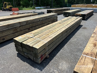 Quantity of (15) Surplus Pressure Treated Lumber 6 in x 8 in x 16 ft Tablas de madera