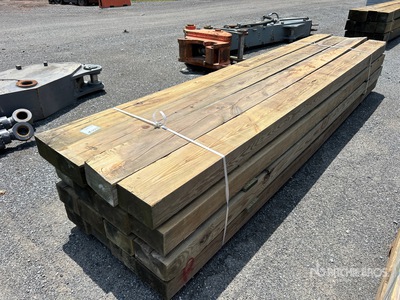 Quantity of (16) Surplus Pressure Treated Lumber 6 in x 10 in x 14 ft Tablas de madera