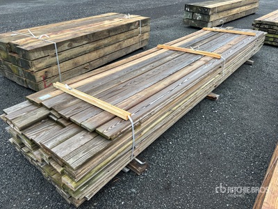 Quantity of (128) Surplus Pressure Treated Lumber 1x6 Tablas de madera