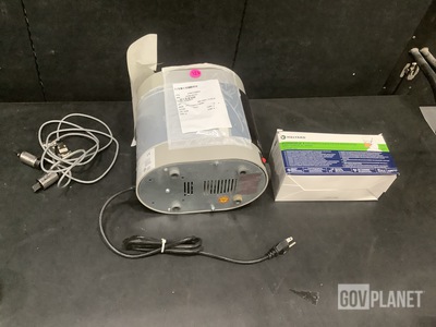 (2) Cables, (1) Curing Unit, (24) Boxes of Masks & Assorted Items