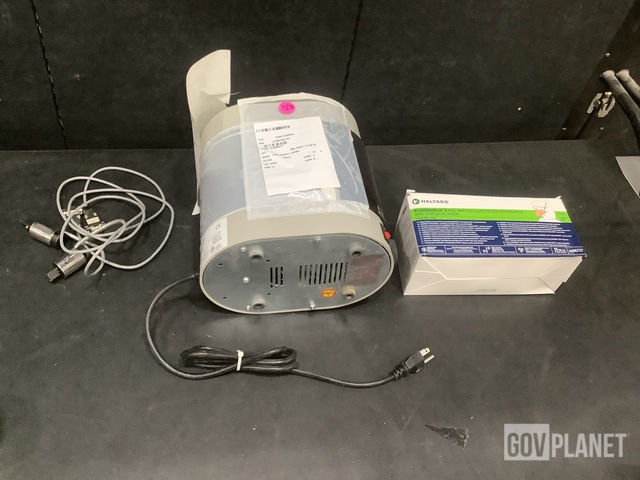 (2) Cables, (1) Curing Unit, (24) Boxes of Masks & Assorted Items