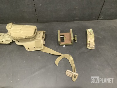(1) Weapon Tripod Cradle, (51) Ammunition Pouches & Assorted Items