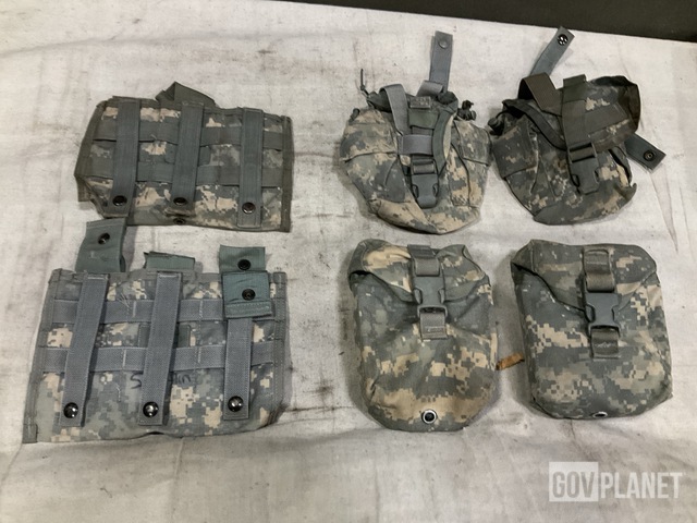(101) First Aid Kit Pouches, (36) M4 Three Mag Pouches & Assorted Items