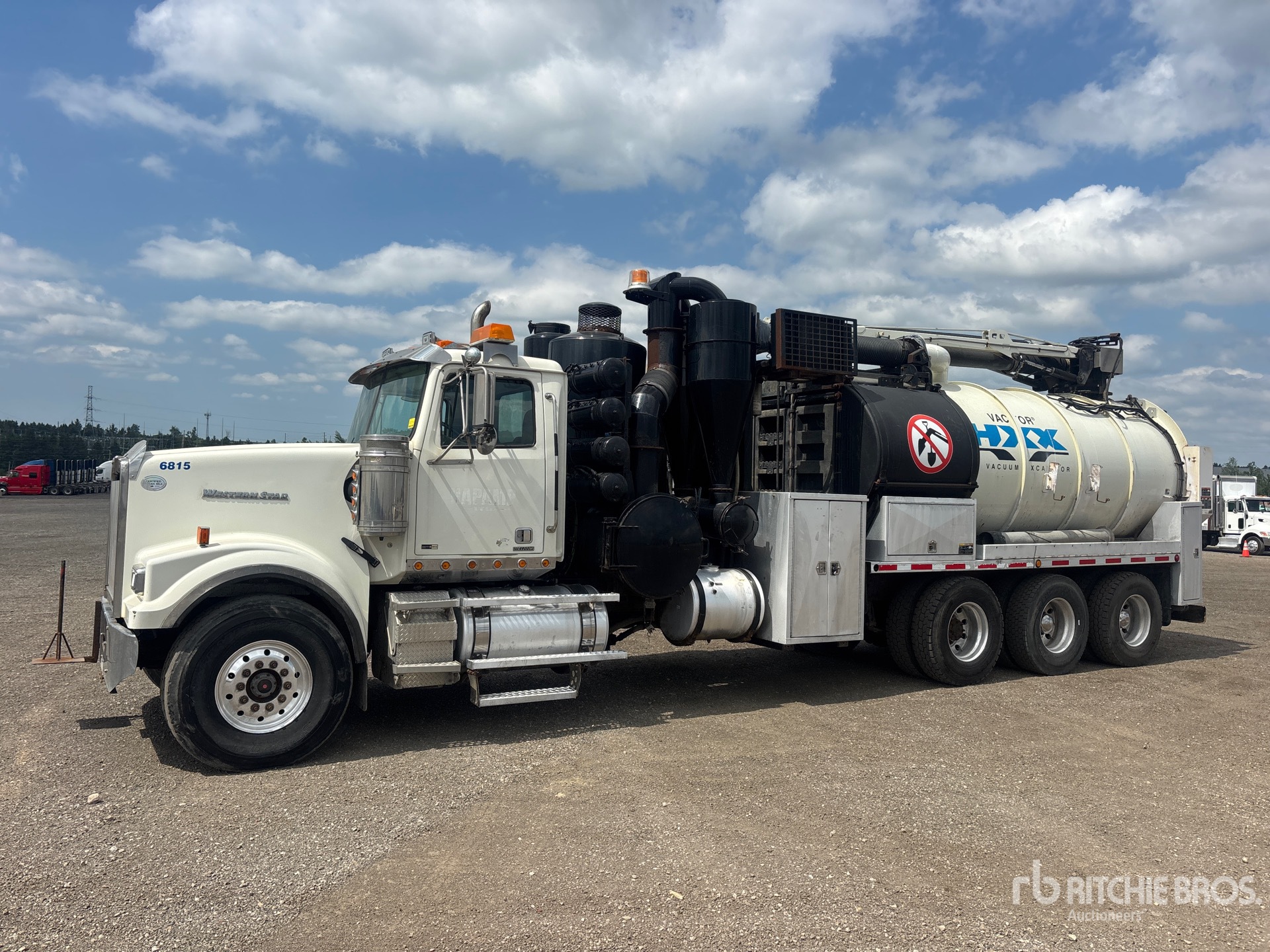Vactor Guzzler on 2015 Western Star 4900SF 8x6 Vacuum Excavator Truck
