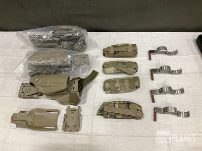 (10) Safariland Holsters, (118) Tourniquet Pouches & Assorted Items