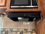 Interior with Stove Hood Exhaust Fan and Vent Cover