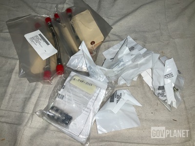 (1) Coupling Half, (7) Hose Assemblies, (9) Machine Bolts & Assorted Items