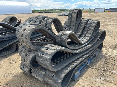 Quantity of (10) John Deere Rubber Tracks