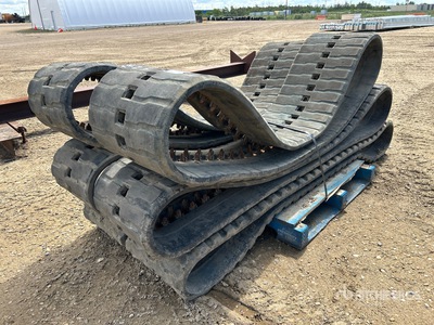 Quantity of (6) John Deere Rubber Tracks