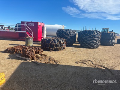 Quantity of (8) 35.5LB32 Dual Tires For Skidder/2 Sets Brand New/2 With Chains Tires