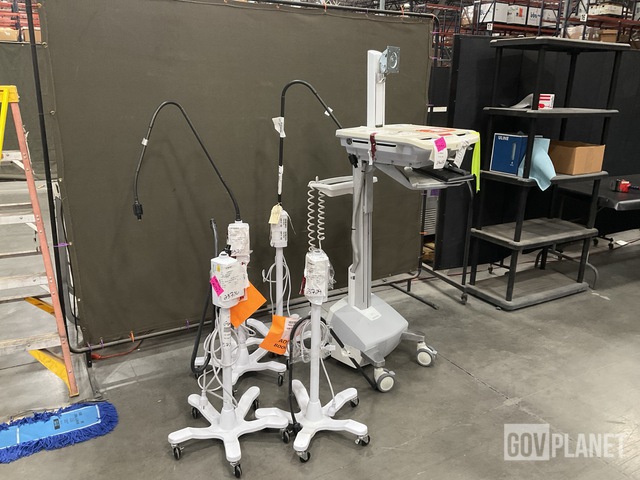 (4) Surgical Examination Lights & (1) Ergotron Medical Cart