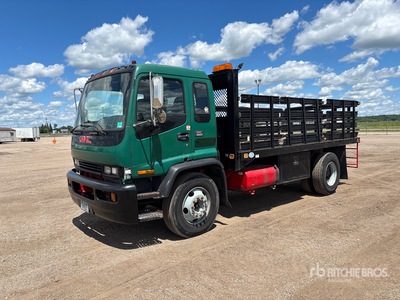 1999 GMC T6500 4x2 شاحنة مسطحة