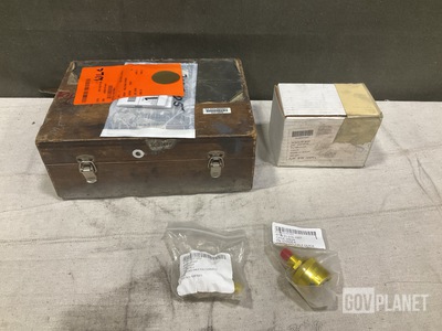 (10) Fluid Filters, (1) Tension Tool, (4) Coupling Halves & Assorted Items