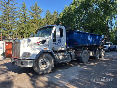 2022 Peterbilt 567 8x4 Tri/A ロールオフトラック