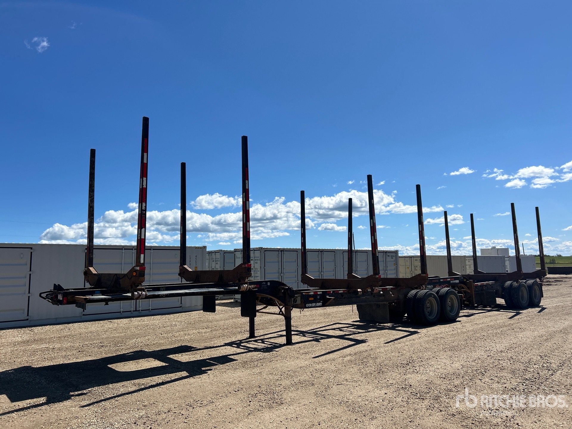 2013 Doepker T/A B-Train Lead Hayrack Log Trailer