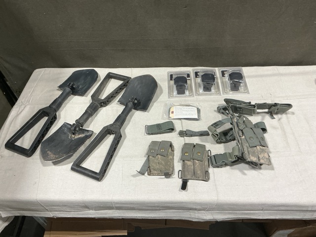 (14) Pistol Holsters, (31) Entrenching Tools & Assorted Items