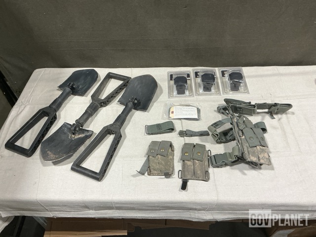 (14) Pistol Holsters, (31) Entrenching Tools & Assorted Items