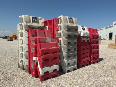 Quantity of (60) Filled New Jersey Barriers Road Signs