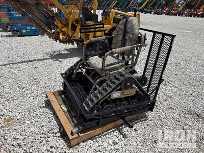 Tracked Electric Track Chair camo with gun holders.