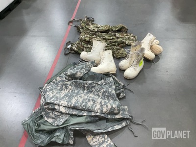 (60) Pairs of Assorted Trousers, (7) Pairs of Boots & Assorted Items