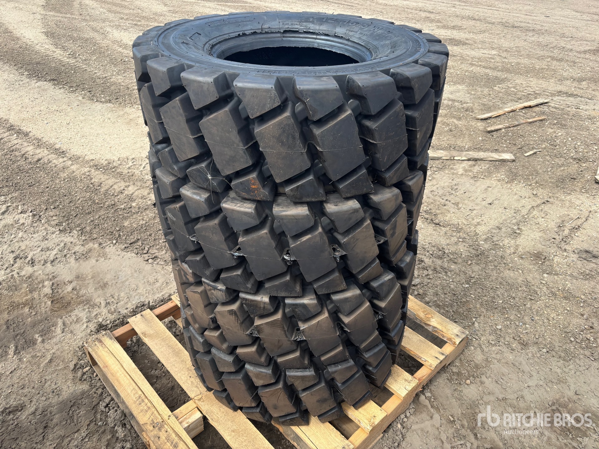 Quantity of (4) 12-16.5 Tires (Unused)