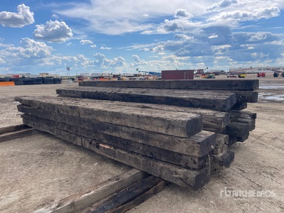 Quantity of (24) 16 in x 8 in x 20 ft Timbers