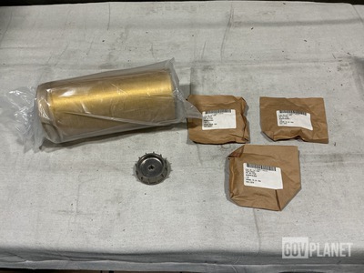 (4) Dog Spanners, (1) Fluid Filter Element, (4) Sleeve Bearings & Assorted Items