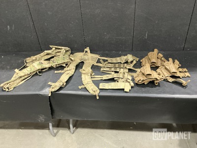 (48) Holster Leg Extenders, (57) Pistol Holsters & Assorted Items