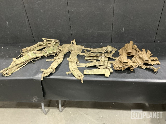 (48) Holster Leg Extenders, (57) Pistol Holsters & Assorted Items
