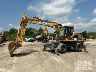 Cat M315 Escavatore gommato