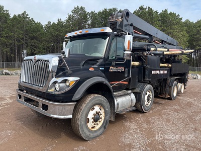 Schwing on 2010 International 7600 SBA 8x4 Twin-Steer Concrete Pump Truck