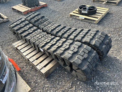 Quantity of (2)  Over The Tire Skid Steer Tracks