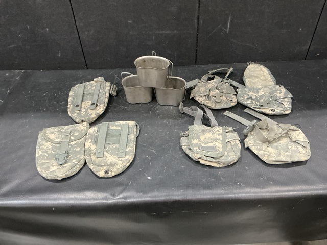 (137) Entrenching Tool Carriers, (15) Water Canteen Cups & (293) Canteen Pouches