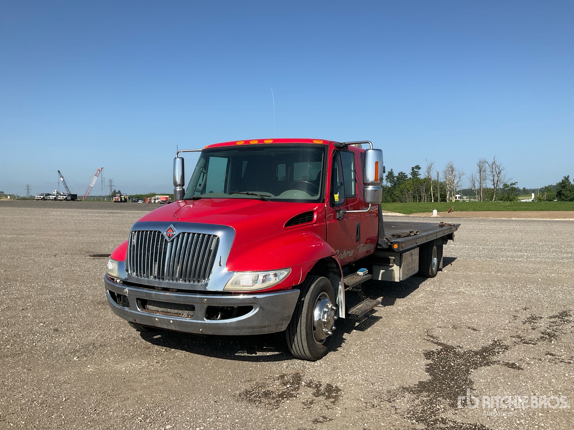 2011 International 4300 SBA 4x2 Extended Cab Rollback Truck