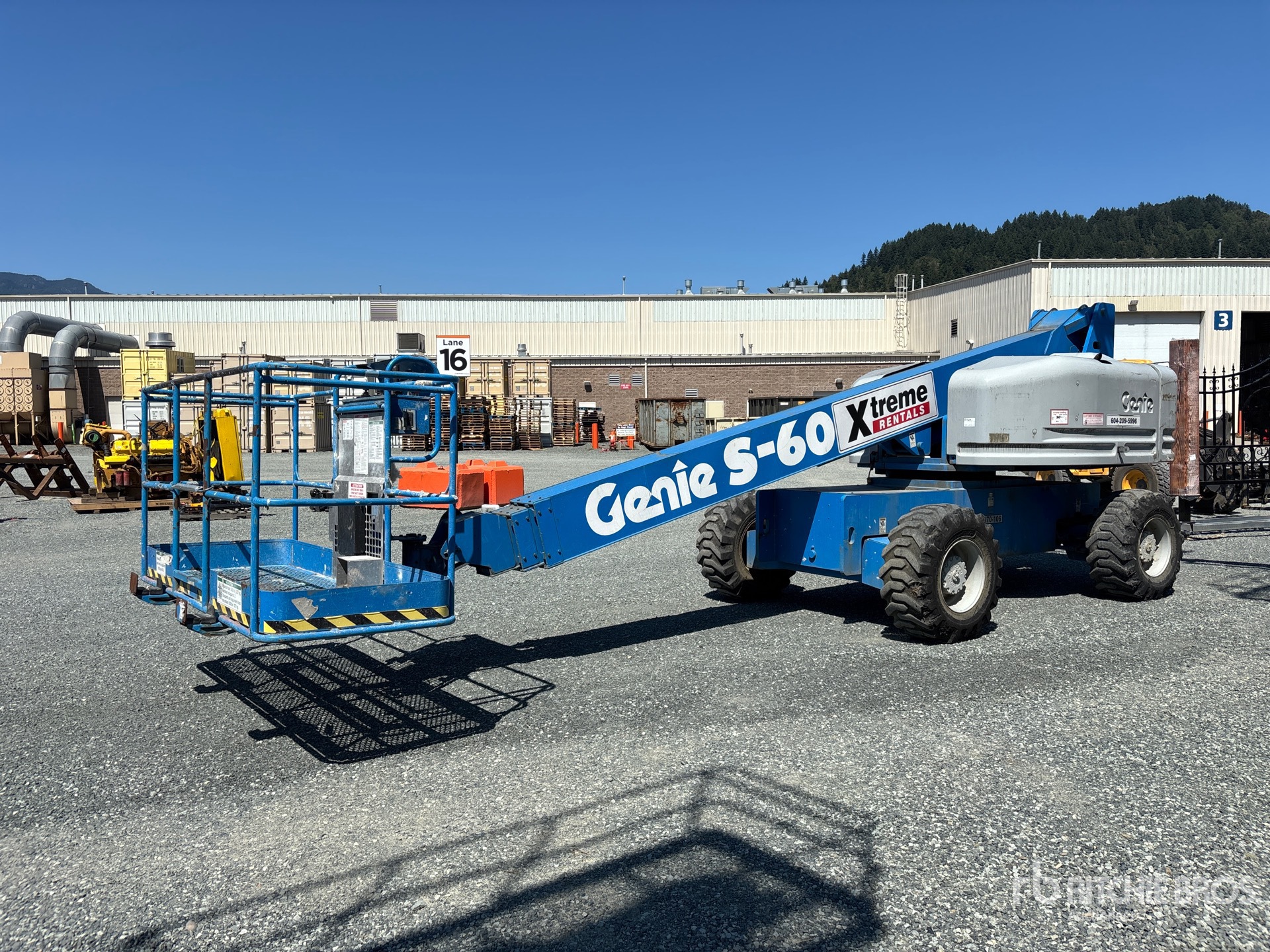 1999 Genie S60 4WD Dual Fuel Telescopic Boom Lift