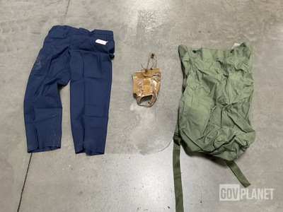 (11) Pairs of Men’s Trousers, (29) Helmet Covers & Assorted Items
