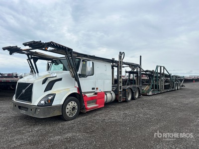 2007 Volvo VNL 6x4 Sleeper Camión portavehiculos