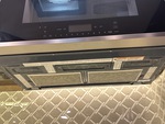 Interior with Stove Hood Exhaust Fan and Vent Cover