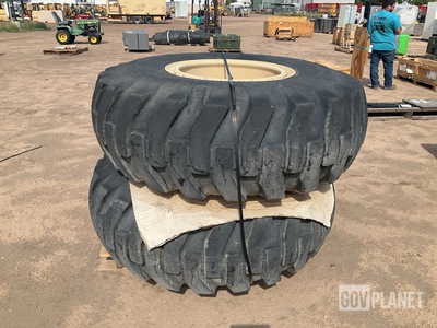 (2) S.T.A 20.5-25 Tires w/Wheels