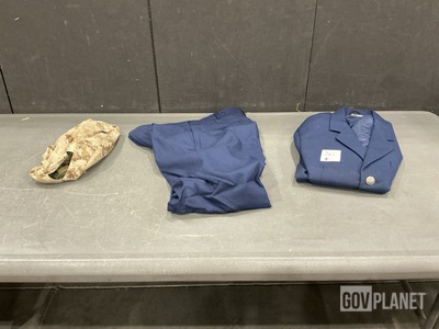 (233) Helmet Covers, (71) Pairs of Trousers, (13) Coats & Assorted Items