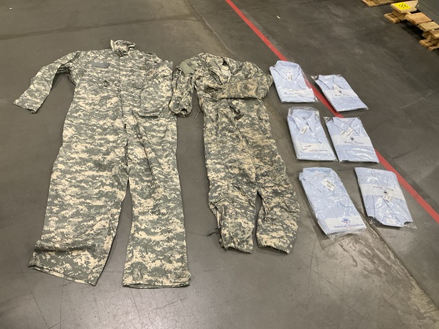 (102) Women's Shirts & (14) Pairs of Mechanic’s Coveralls (102) Women's Shirts & (14) Pairs of Mechanic’s Coveralls