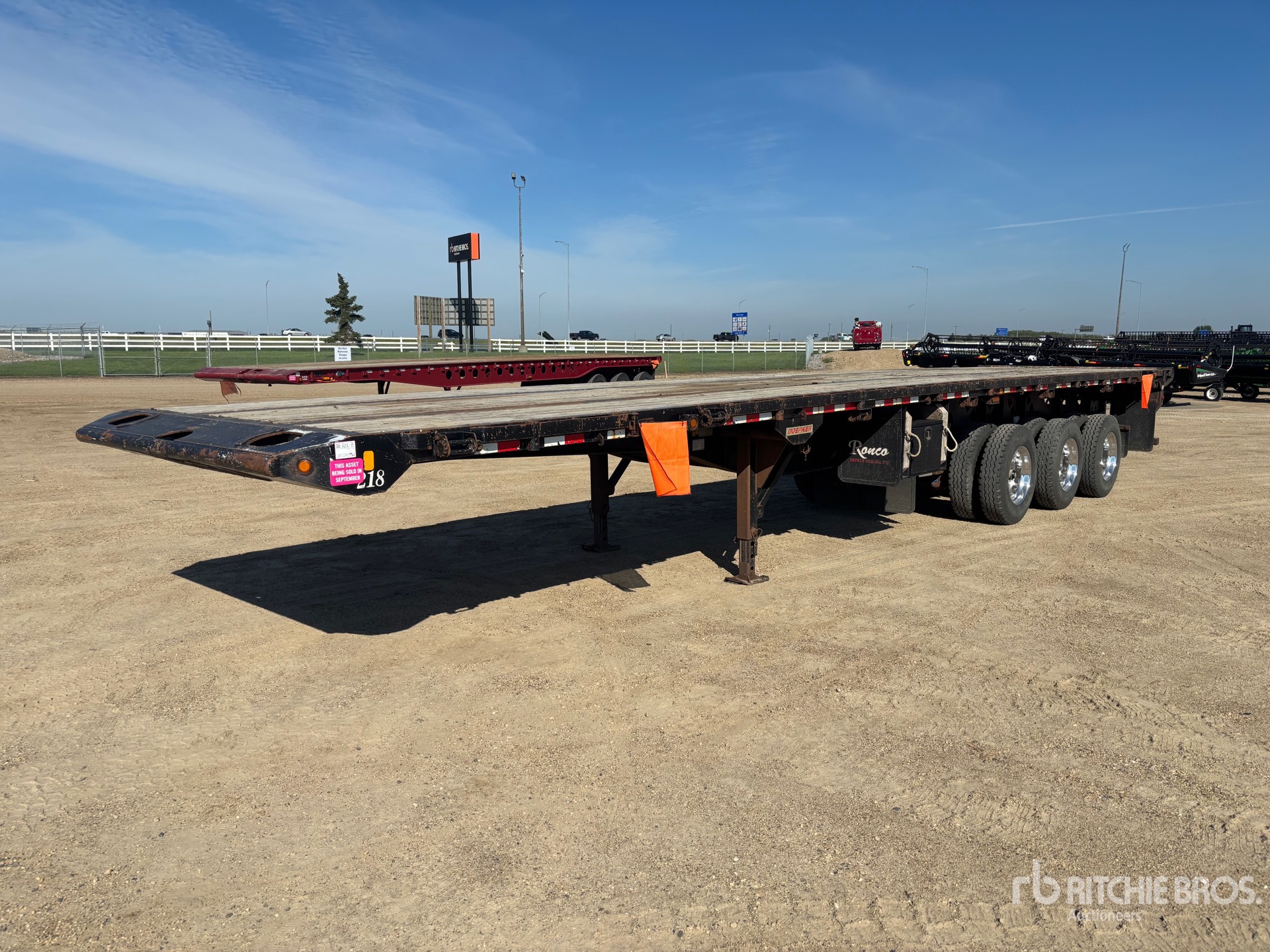 2014 Doepker 67500 lb 46 ft Tri/A Flatbed Oilfield Trailer