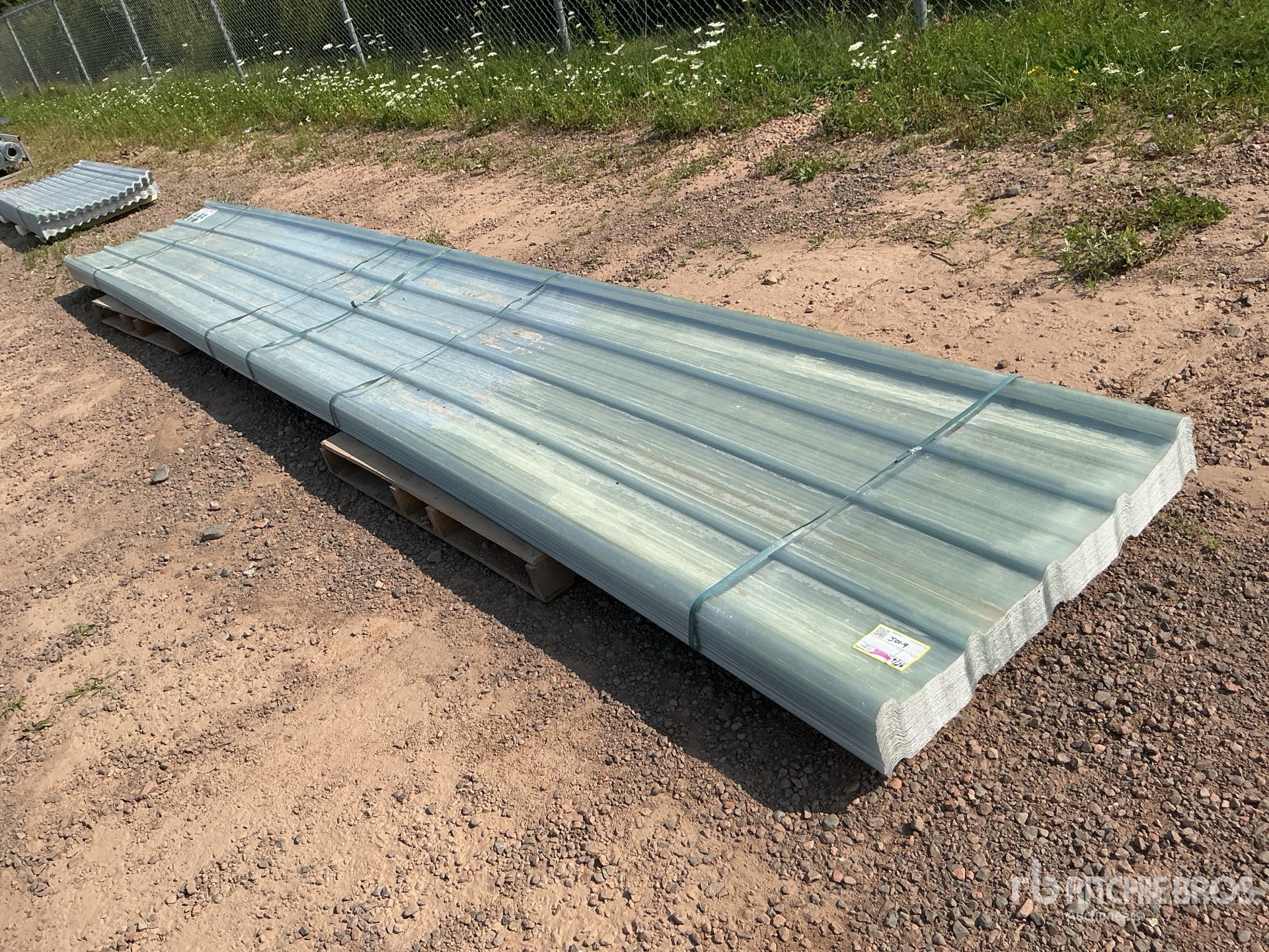 Quantity of (50) 35 in x 19.69 ft Clear Corrugated Polycarbonate Roof Panel (Unused)