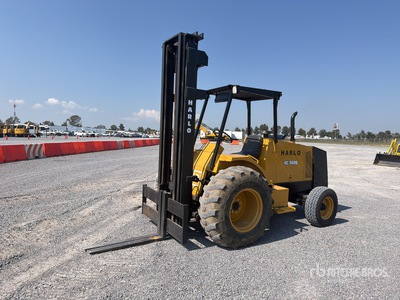1999 Harlo HC5600 6000 lb Montacargas Todo Terreno / Rough Terrain Forklift