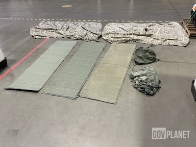 (23) Self-Inflating Sleeping Mats, (27) Wet Weather Ponchos & Assorted Items