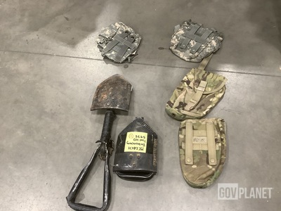 (46) Canteen Pouches, (4) Entrenching Tools, (28) Tool Carriers & Assorted Items