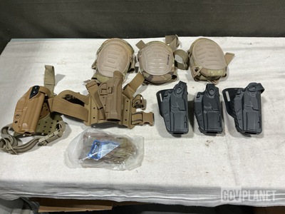 (11) Pistol Holsters, (4) Safariland Assembly Holsters & Assorted Items