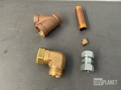 (2) Pipe Laterals, (4) Tube Reducers, (20) Pump Locking Plates & Assorted Items
