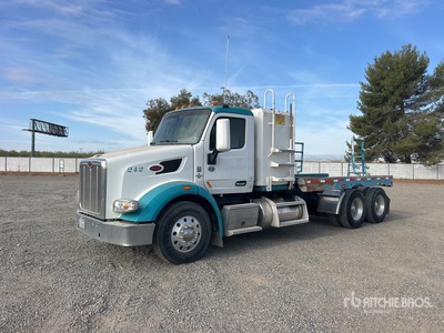 2014 Peterbilt 567 6x4 T/A Pipe Rack Flatbed Truck