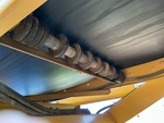 Feeder with Abführbandrollen
